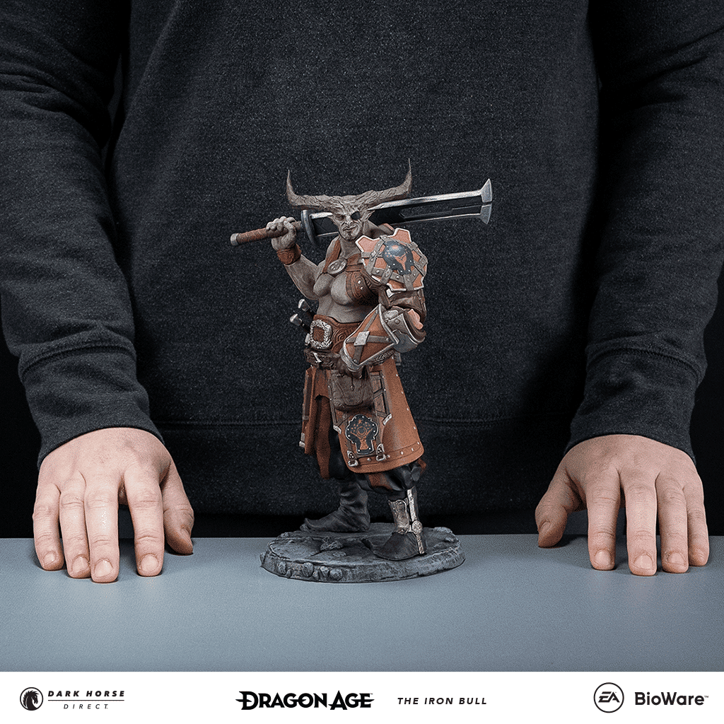 The Iron Bull statuette in front of a person for scale.