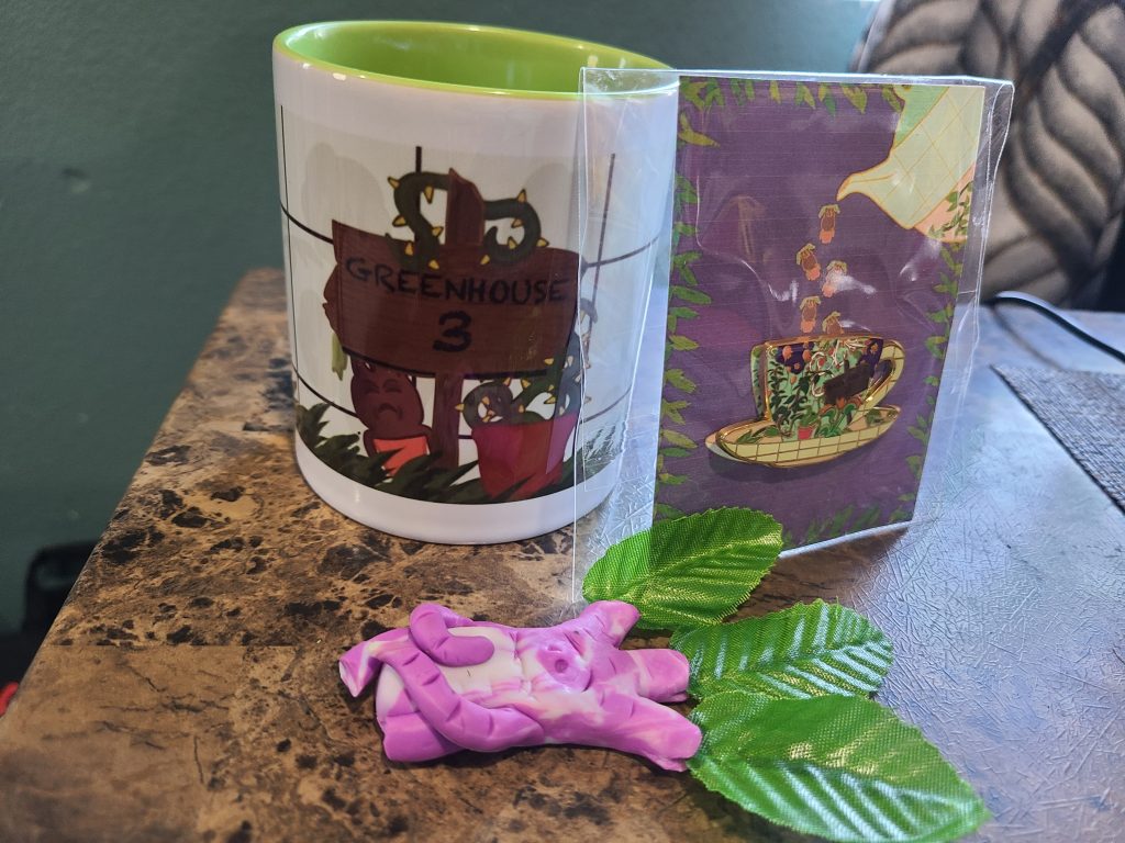 Collective Teacup, teacup pin, and mandrake seedling. All from Alchemy of the skin's Herbology 102 box.