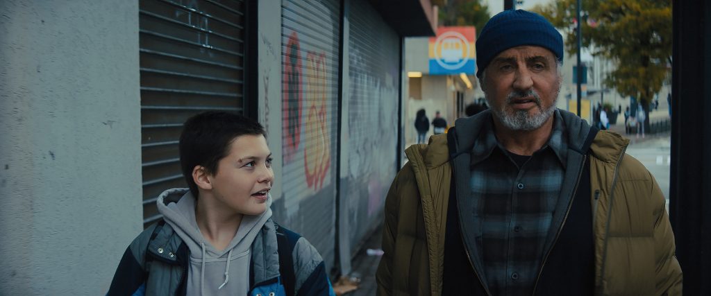 Javon "Wanna" Walton (left) as Sam Cleary and Sylvester Stallone (right) as Joe Smith in SAMARITAN, directed by Julius Avery, a Metro Goldwyn Mayer Pictures film. Credit: Metro Goldwyn Mayer Pictures © 2022 Metro-Goldwyn-Mayer Pictures Inc. All Rights Reserved.